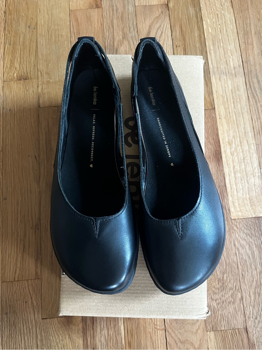Women's Black Leather Slip-On Flats